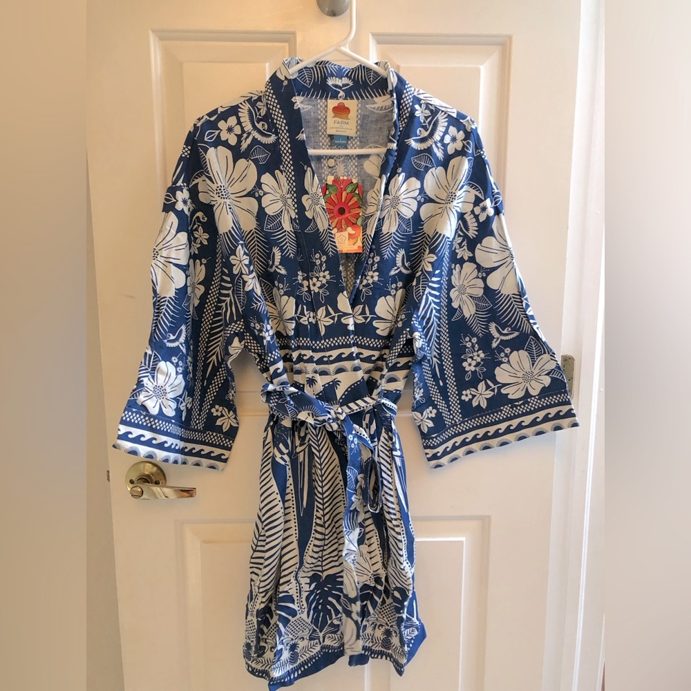 Farm for Anthro flowered blue tunic, never been worn!